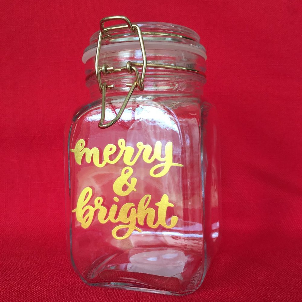 Merry & Bright Square Glass Jar with Gold Tone Lettering Wire Bail Lid